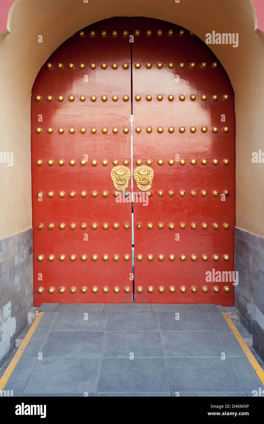 traditional Chinese red door at Temple of Heaven in Beijing which is one of the landmark of Beijing Stock Photo