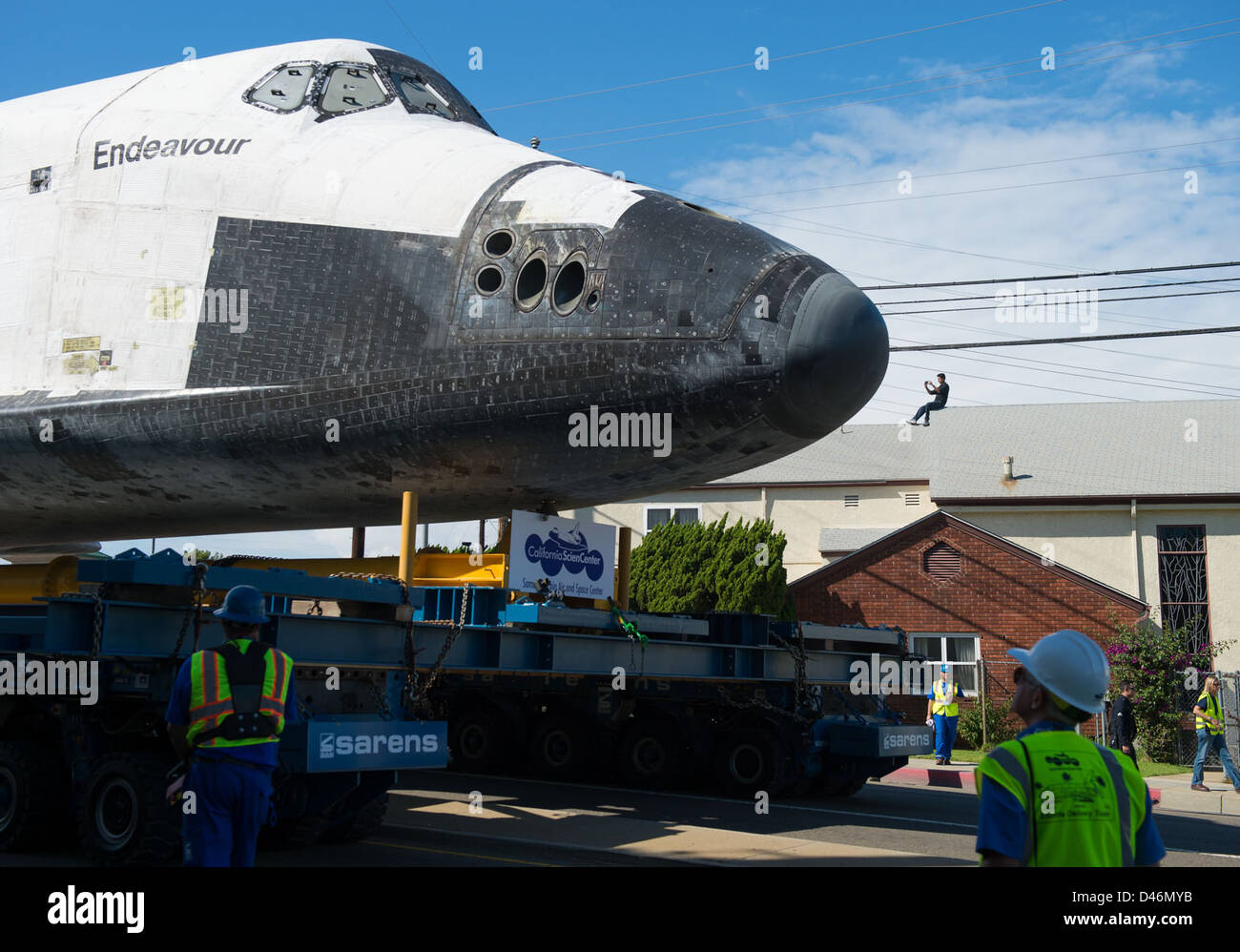 Space Shuttle Endeavour is moved through Los Angeles on its way to the ...
