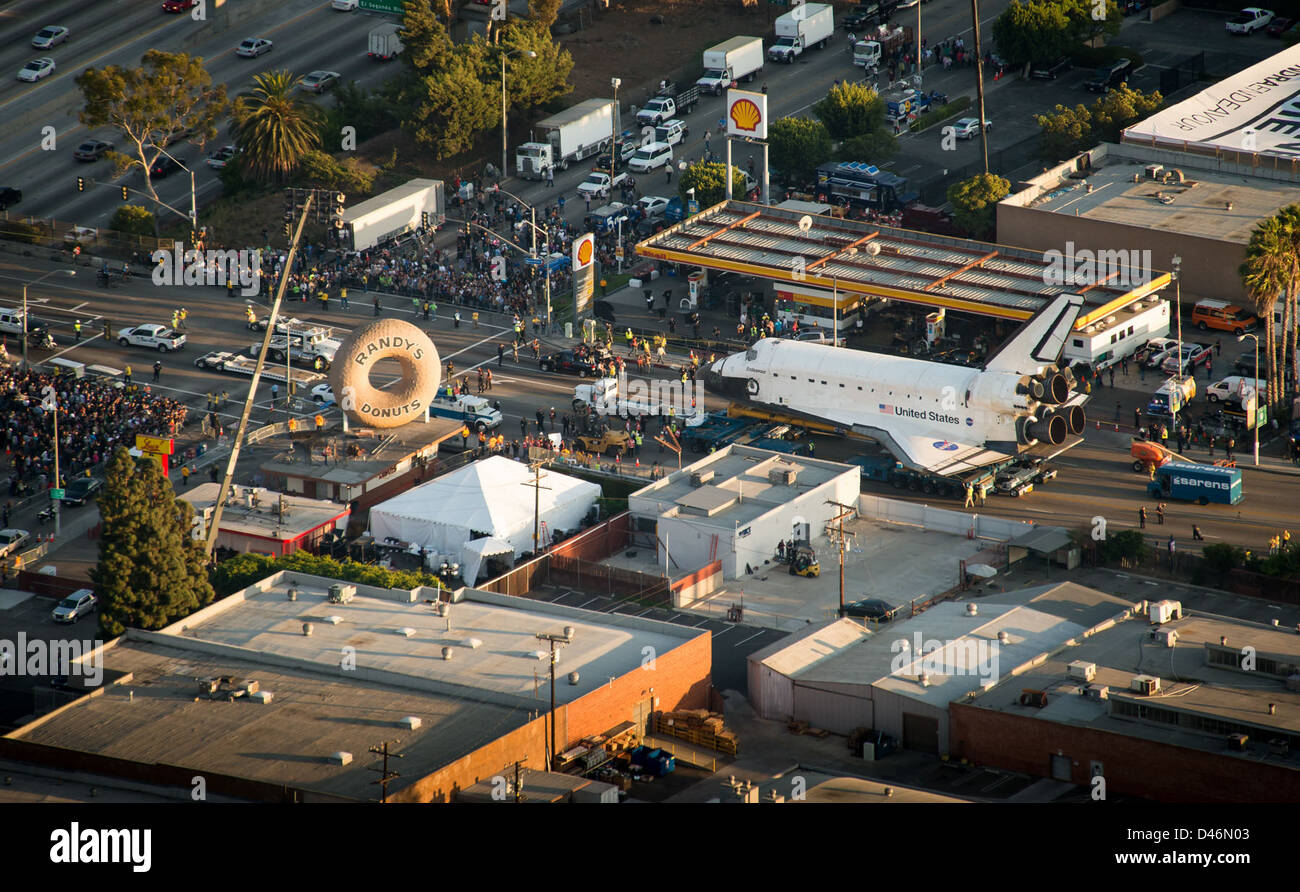 Space Shuttle Endeavour was transported via helicopter to its final ...