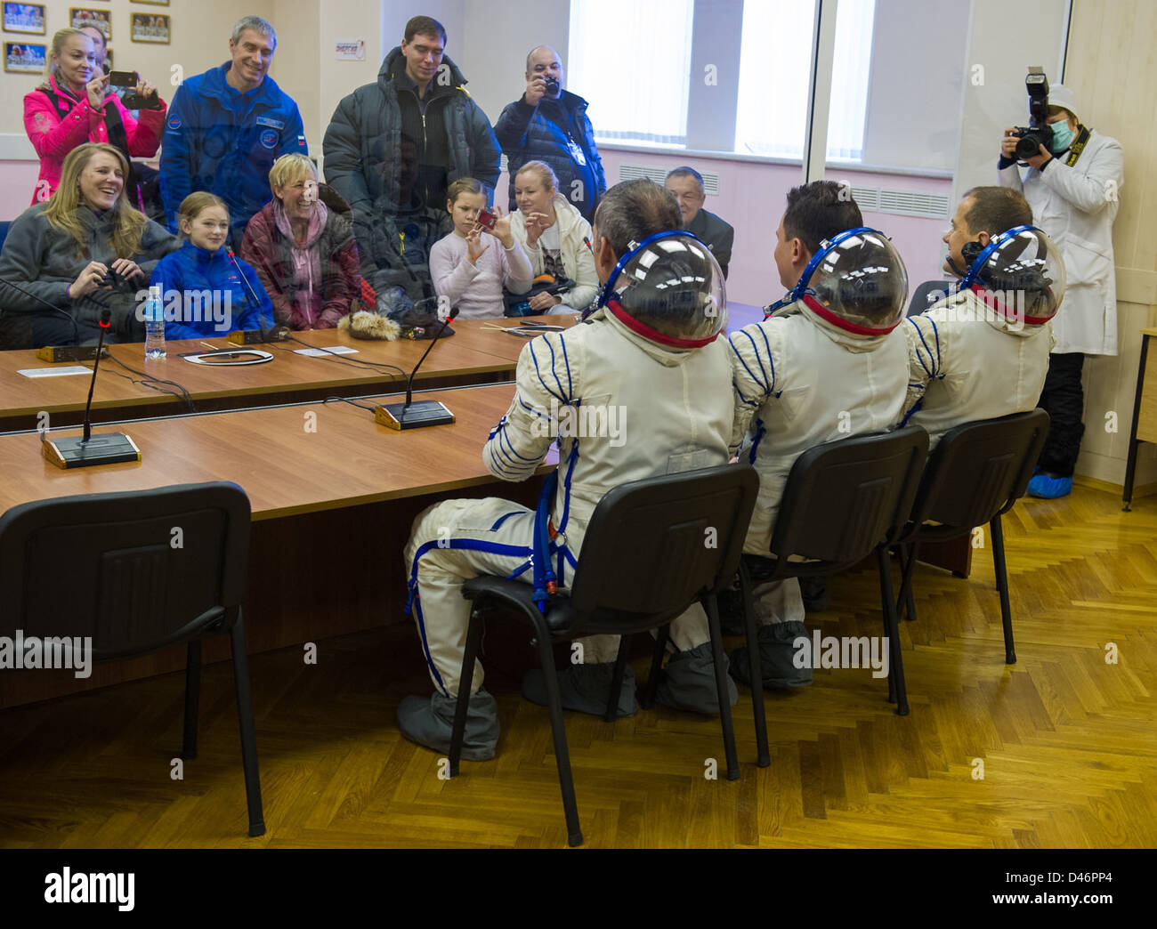 Expedition 34 crew members, including Chris Hadfield and Andrey Shelepin, prepare for their mission at Baikonur Cosmodrome in Kazakhstan. The crew is set to launch aboard Soyuz for the International Space Station. Stock Photo