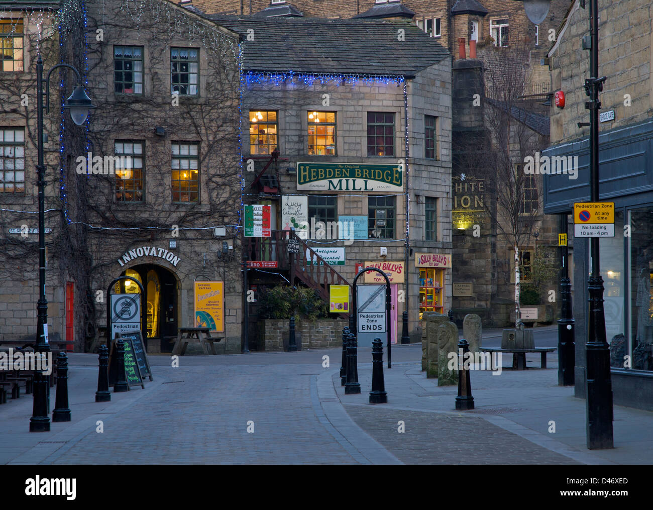 Shops bordering St George's Square in the town of Hebden Bridge, West Yorkshire, England UK Stock Photo