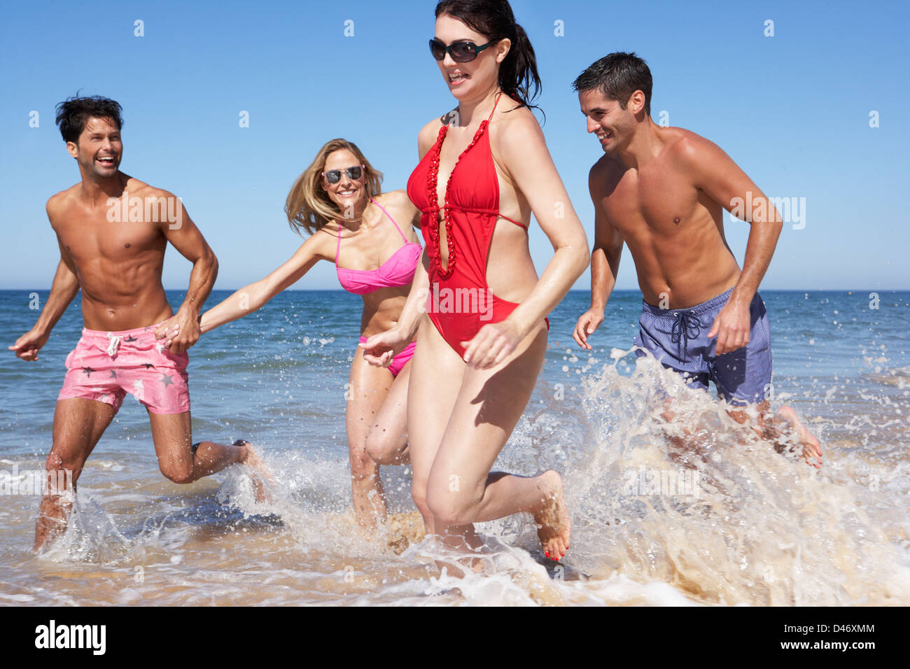 beach-bikini-horizontal-female-group-hi-res-stock-photography-and