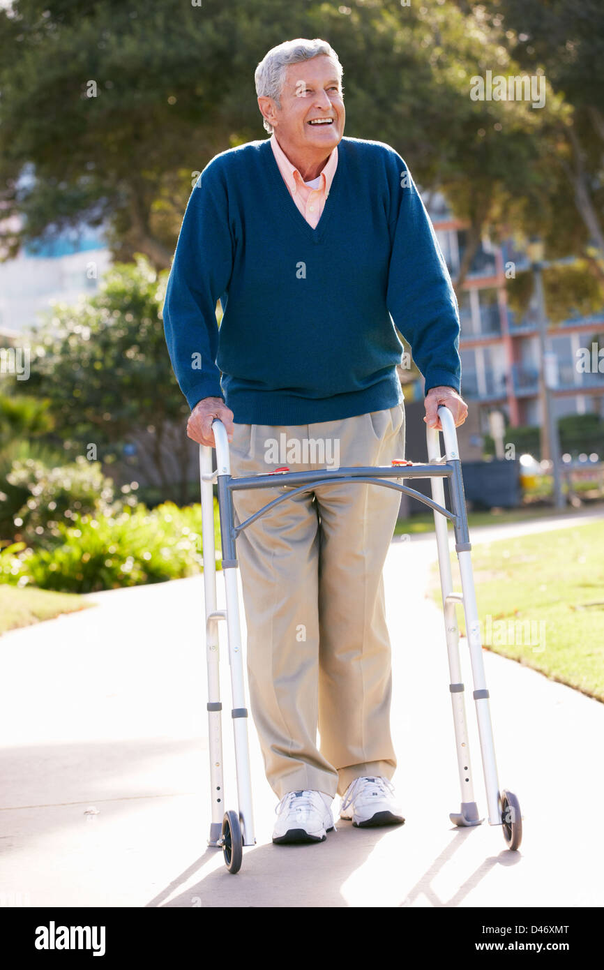 Senior Man With Walking Frame Stock Photo