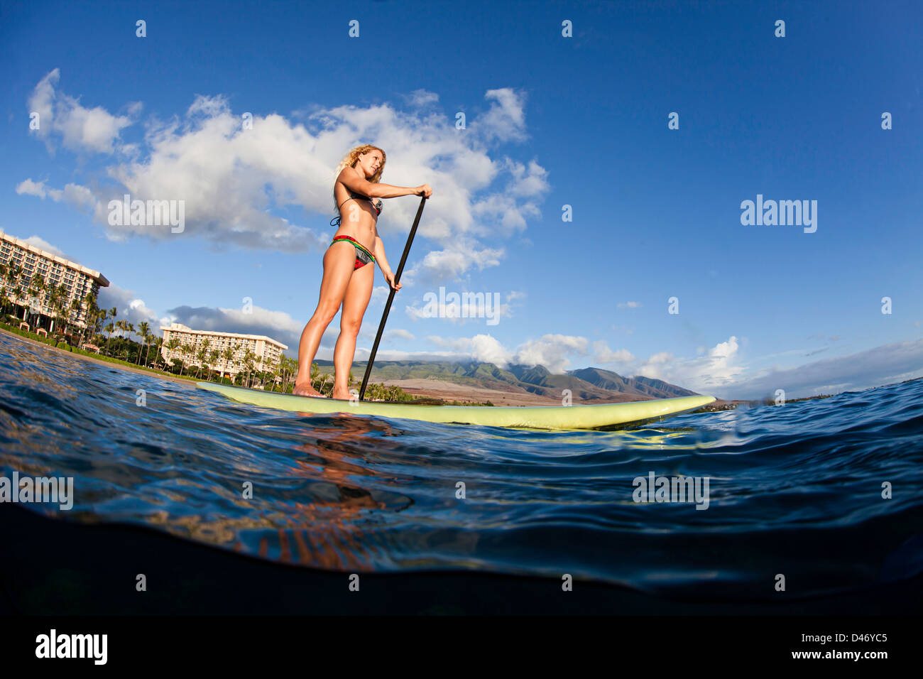 Surf instructor Tara Angioletti on a standup paddle board off Canoe