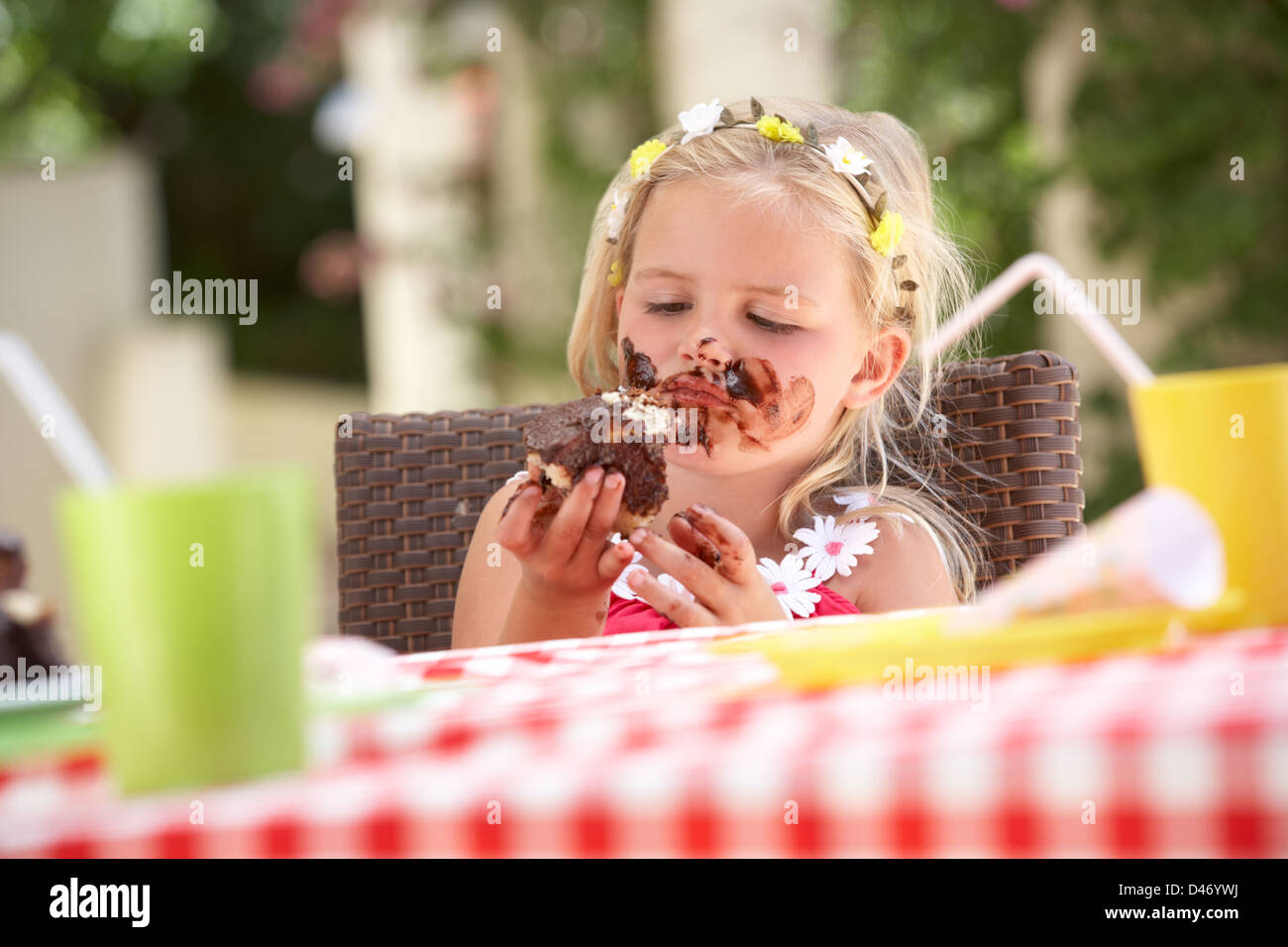 Messy Girl Eating Chocolate Cake Stock Photo