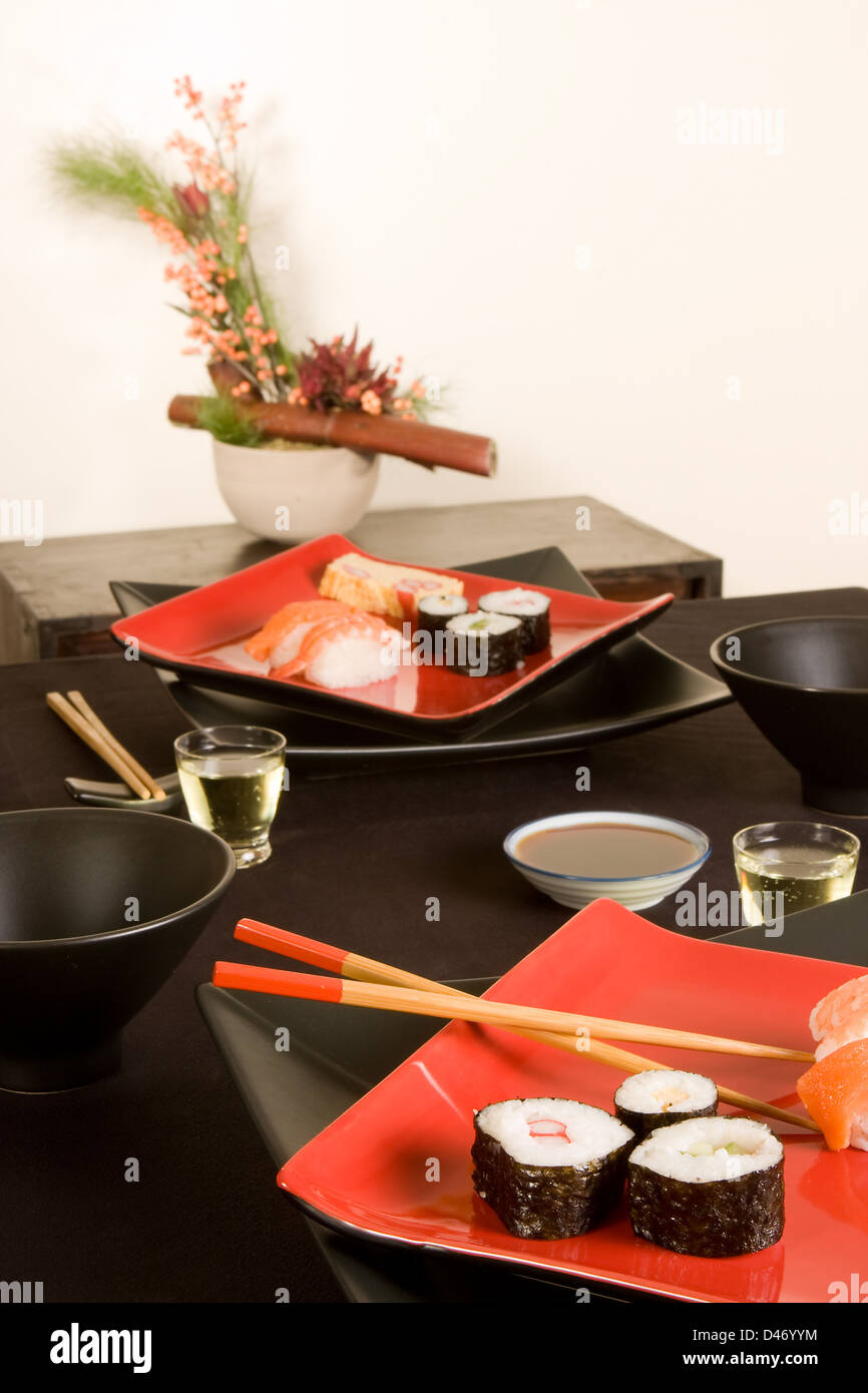 Japanese dinner setting sushi ikebana hires stock photography and