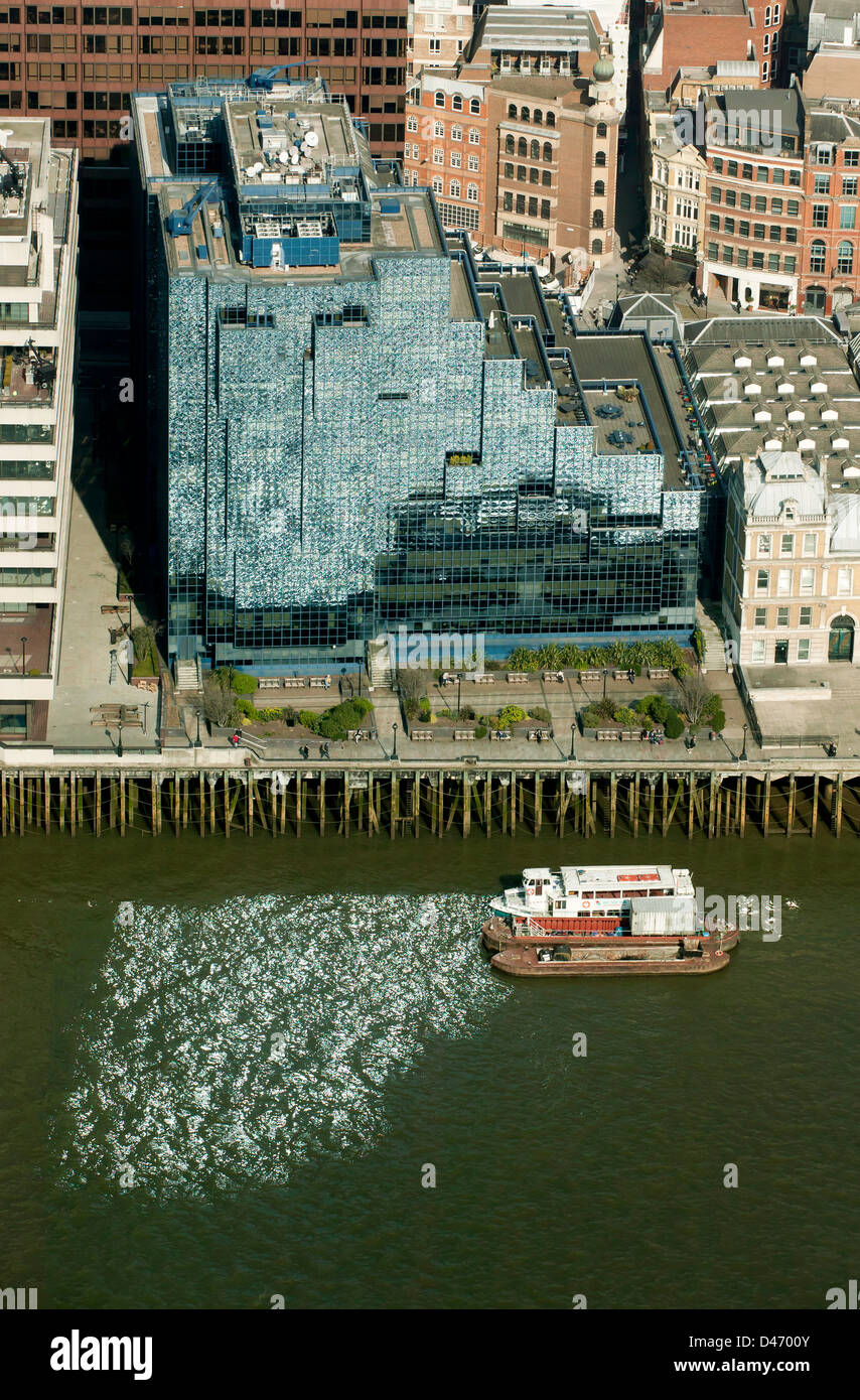 Aerial view of the  Northern & Shell building, a glass-fronted modern office building by the river Thames. Stock Photo