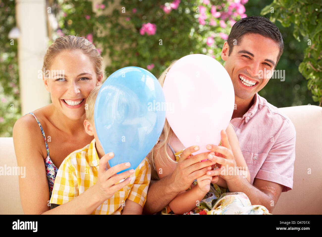 Portrait of family with balloons hi-res stock photography and images ...