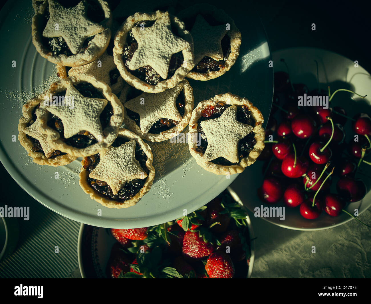 Christmas mince pies, cherries and strawberries, seasonal christmas fare in New Zealand Stock Photo