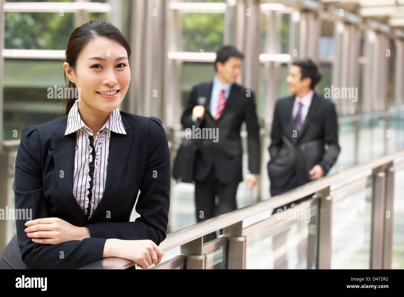 Chinese woman in business suit smiling hi-res stock photography and ...