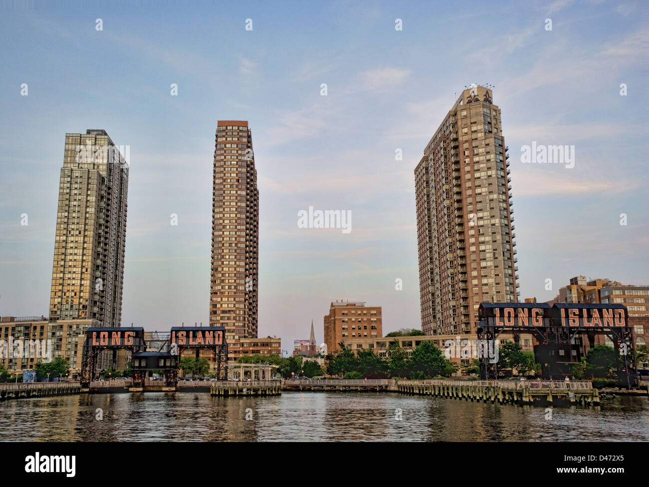 'Long Island' signs on the pier in Gantry Plaza at sunset, Brooklyn, New York. Stock Photo