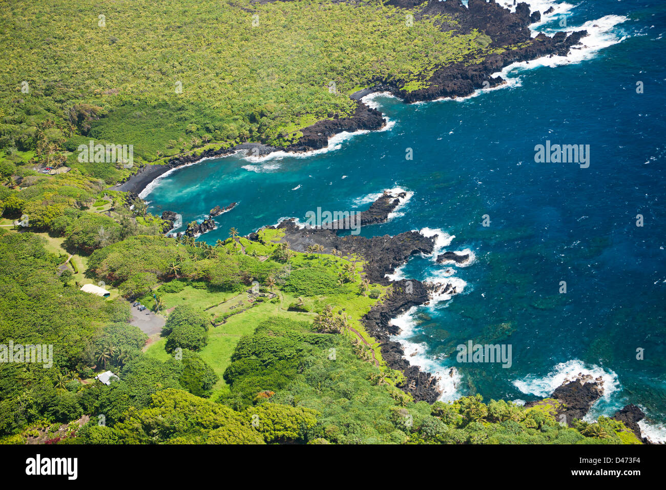 An aerial view of Waianapanapa State Park and it's black sand beach, Maui, Hawaii. Stock Photo