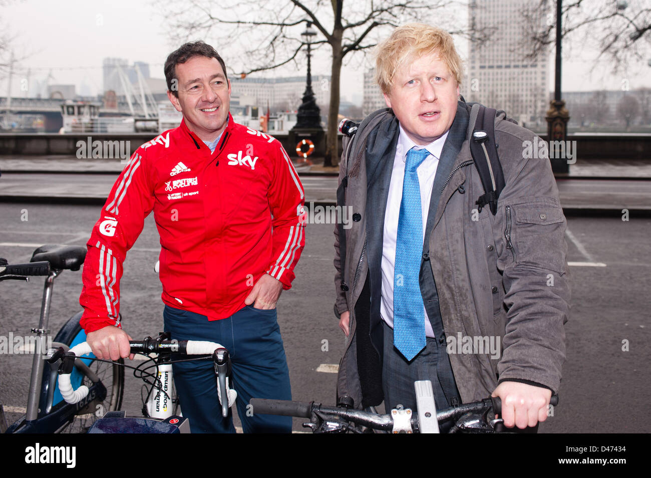 London, UK. 7th March 2013. The Mayor of London Boris Johnson and British Cycling’s Chris Boardman MBE – a former World Champion and Olympic gold medallist – arrive by bike at Victoria Embankment for interviews about the new vision for cycling. Pcruciatti / Alamy Live News Stock Photo