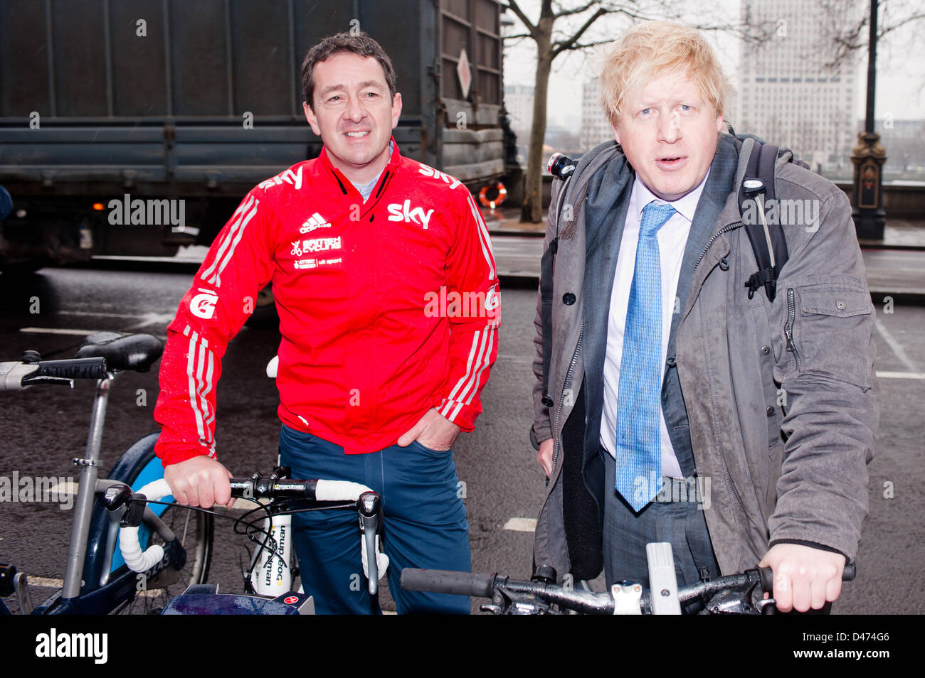London, UK. 7th March 2013. The Mayor of London Boris Johnson and British Cycling’s Chris Boardman MBE – a former World Champion and Olympic gold medallist – arrive by bike at Victoria Embankment for interviews about the new vision for cycling. Pcruciatti / Alamy Live News Stock Photo