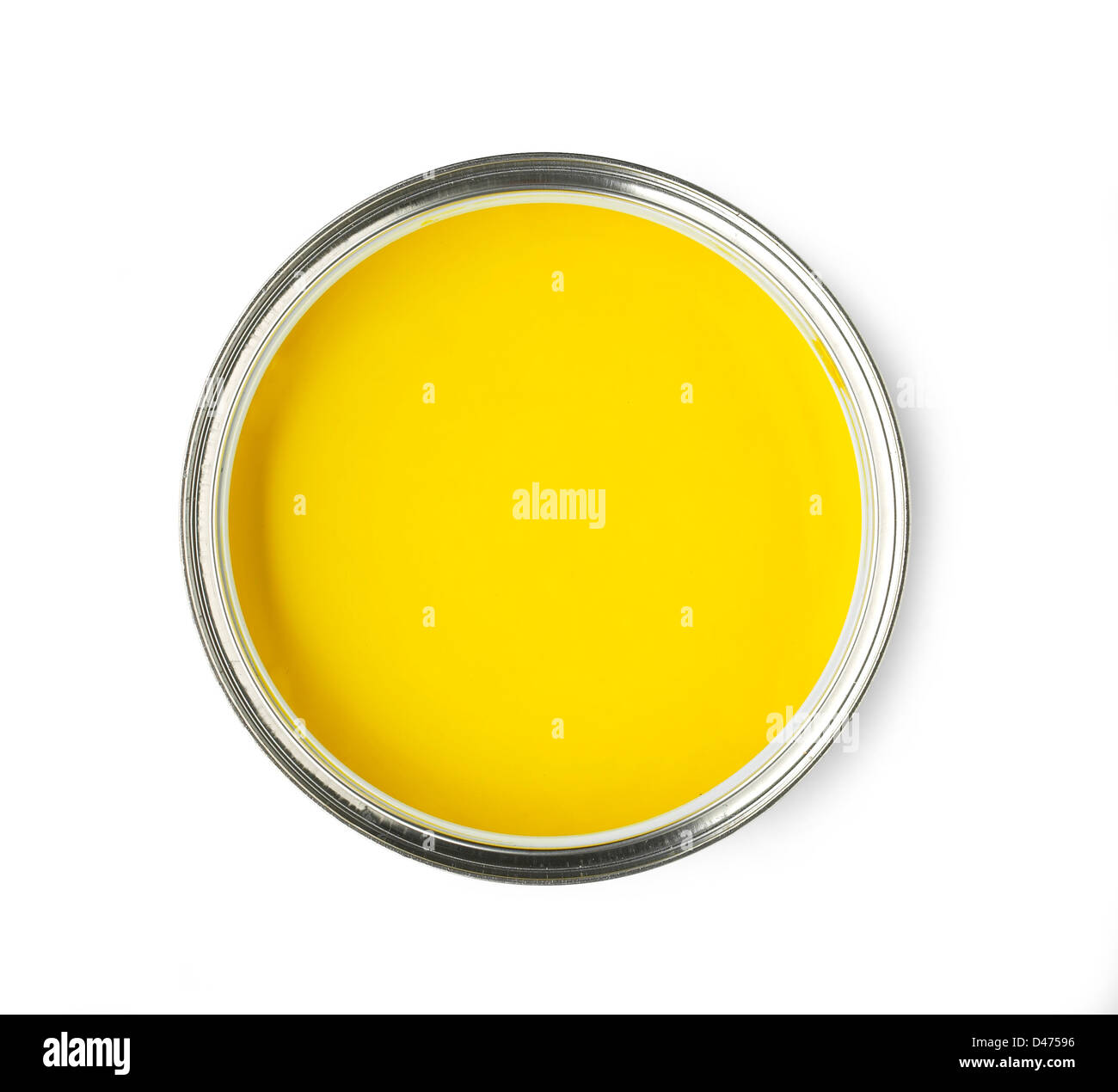 Overhead view of top of yellow paint pot cut out white background Stock Photo