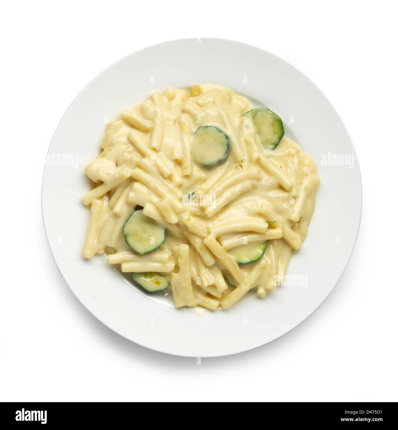 Plate of Pasta with courgette cut out white background Stock Photo