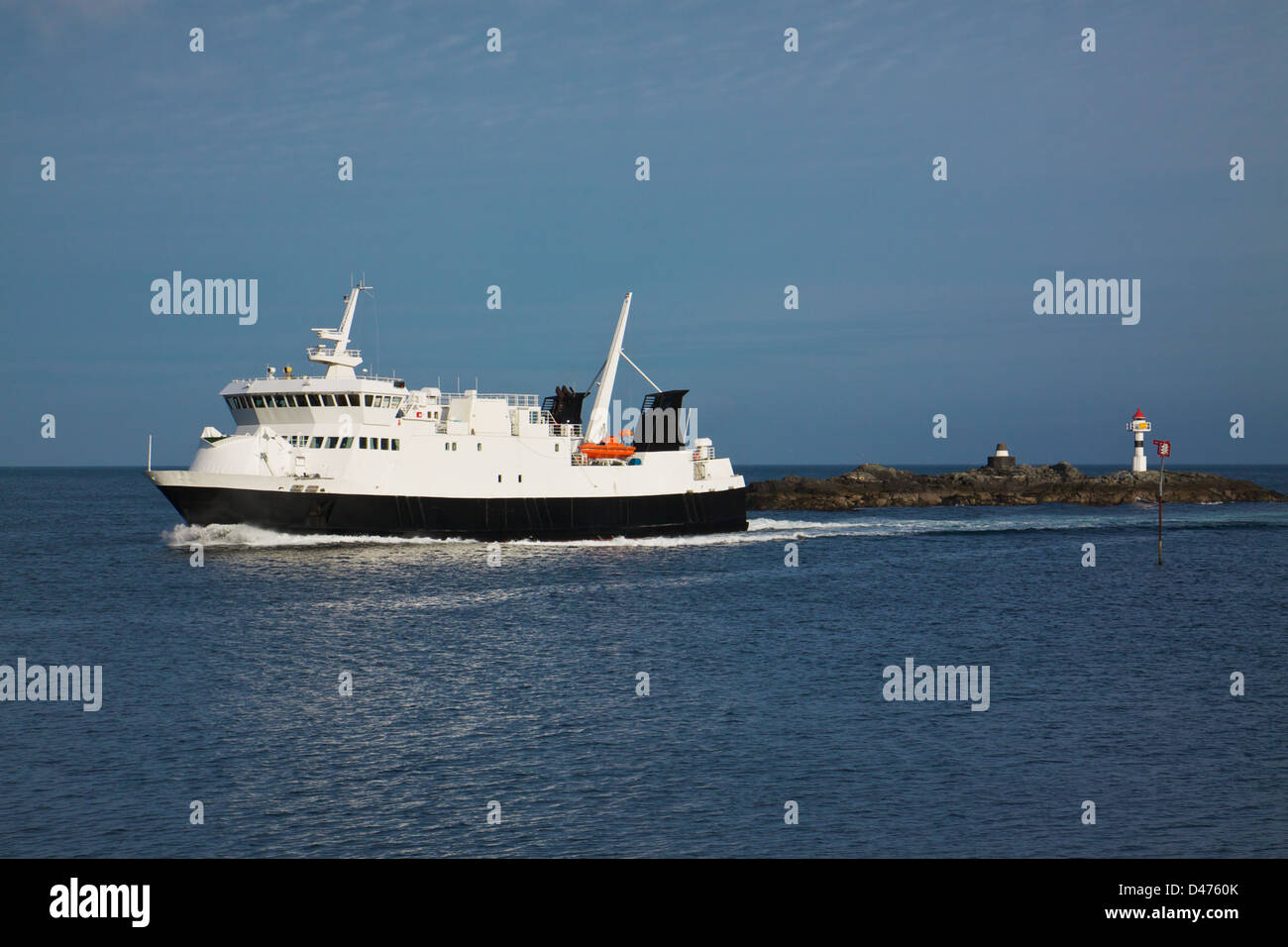 Ferry to Lofoten islands in Norway arriving to harbor Stock Photo Alamy