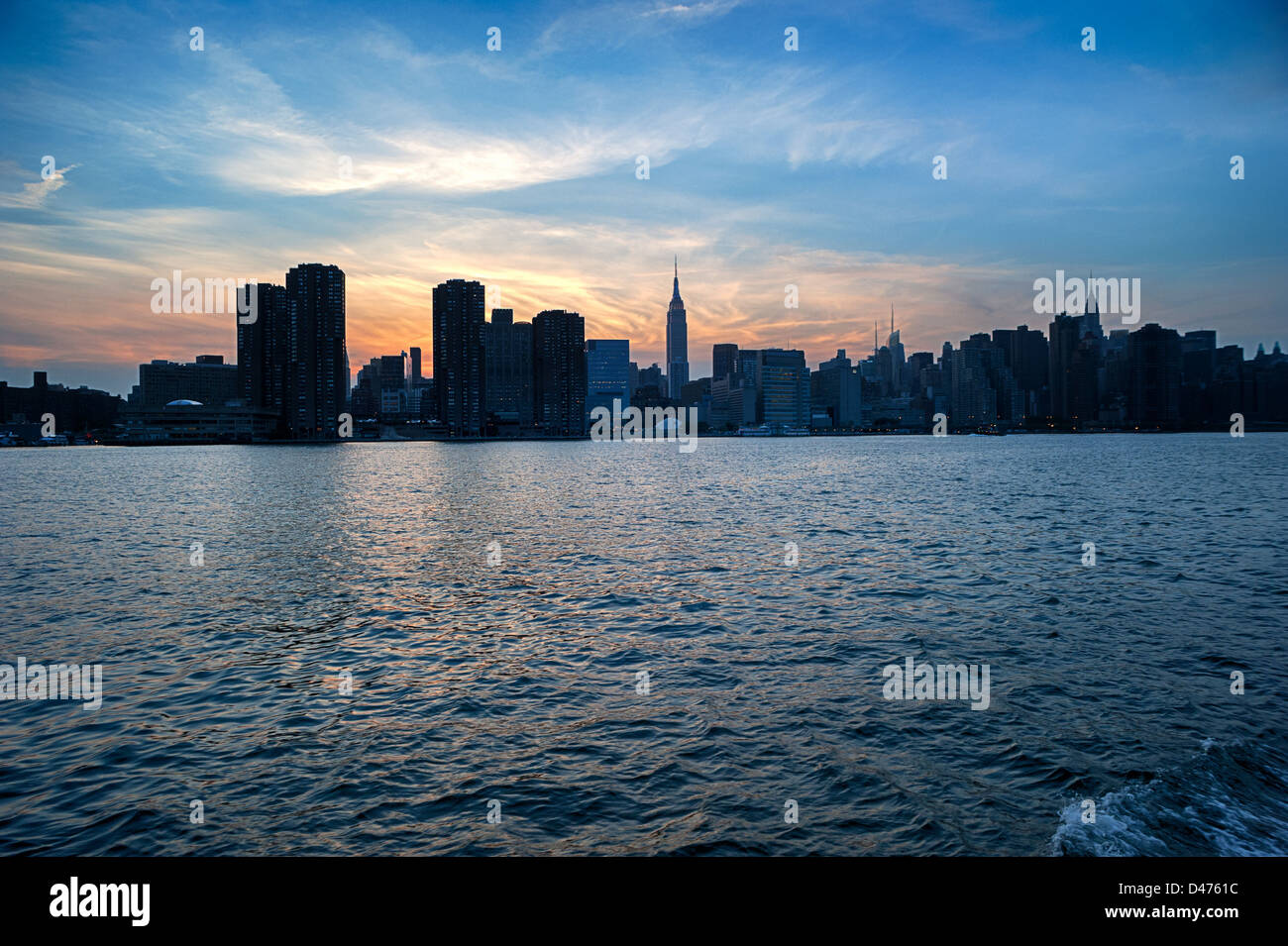 Silhouette of New York City skyline featuring the Empire State ...