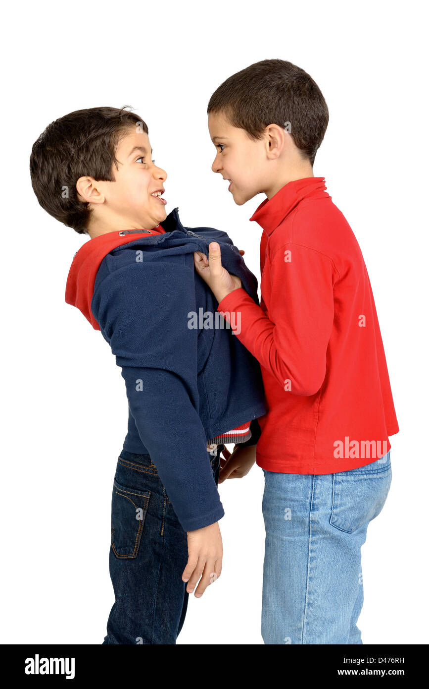 Two boys fighting isolated in white Stock Photo