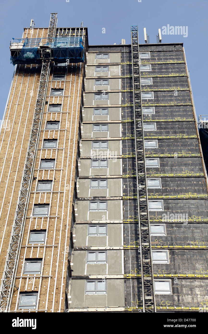 Thermal insulation being applied to the exterior of high rise housing, Edmiston Drive, Ibrox, Glasgow, Scotland, UK Stock Photo