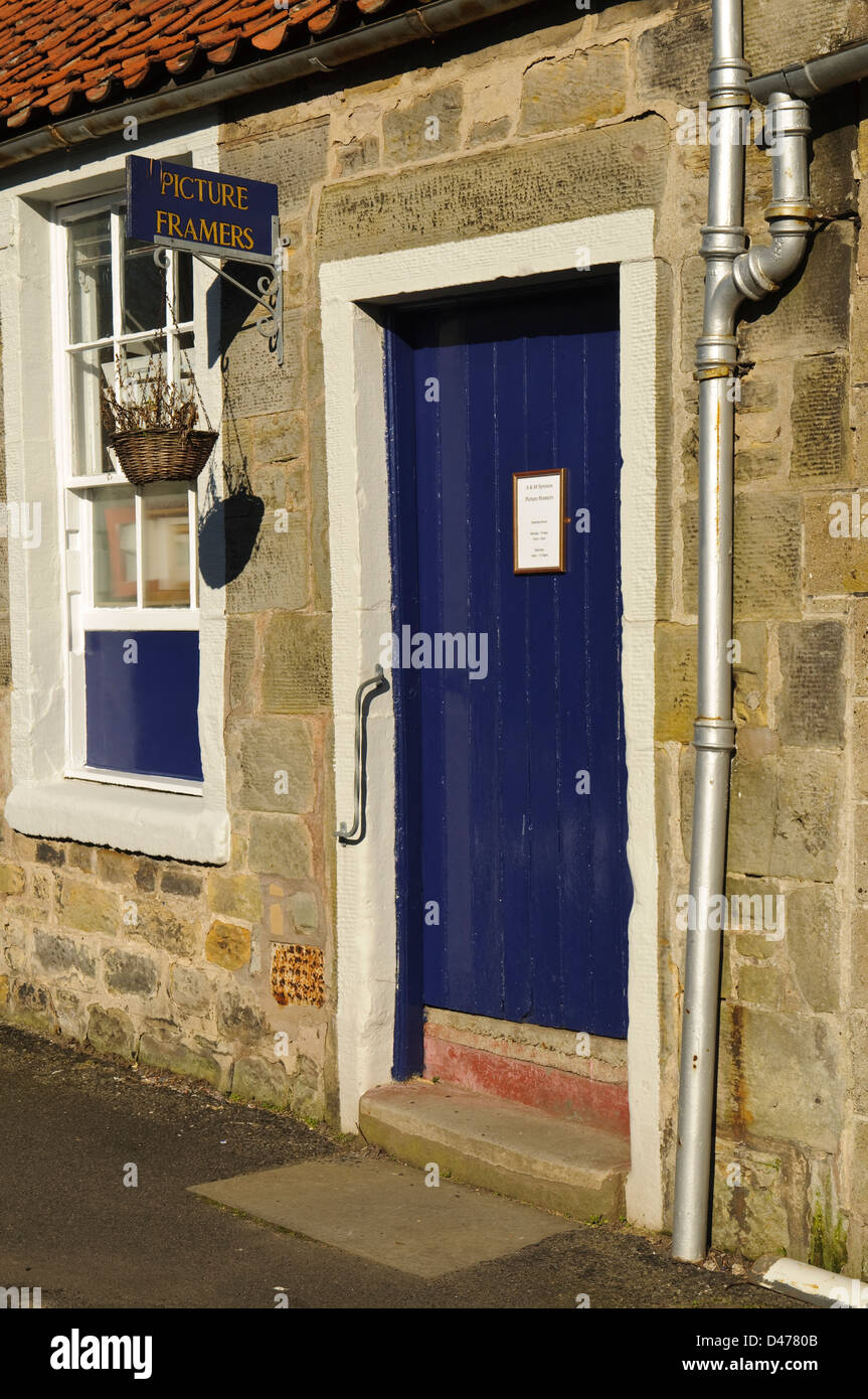 Blue door at picture framers, St. Andrews, Fife, Scotland, UK Stock