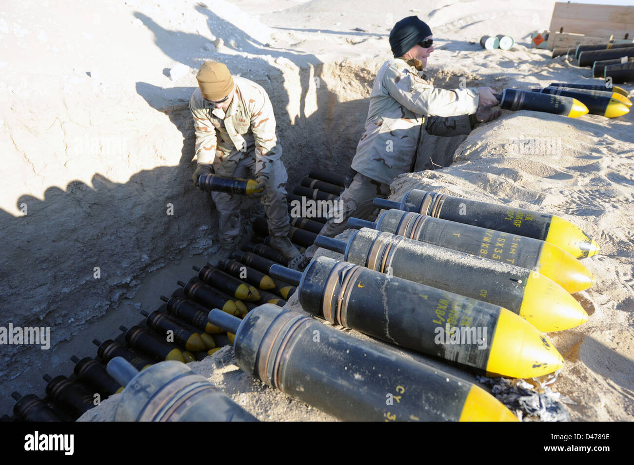 Operators build a 1,500pound munitions disposal shot during demolition