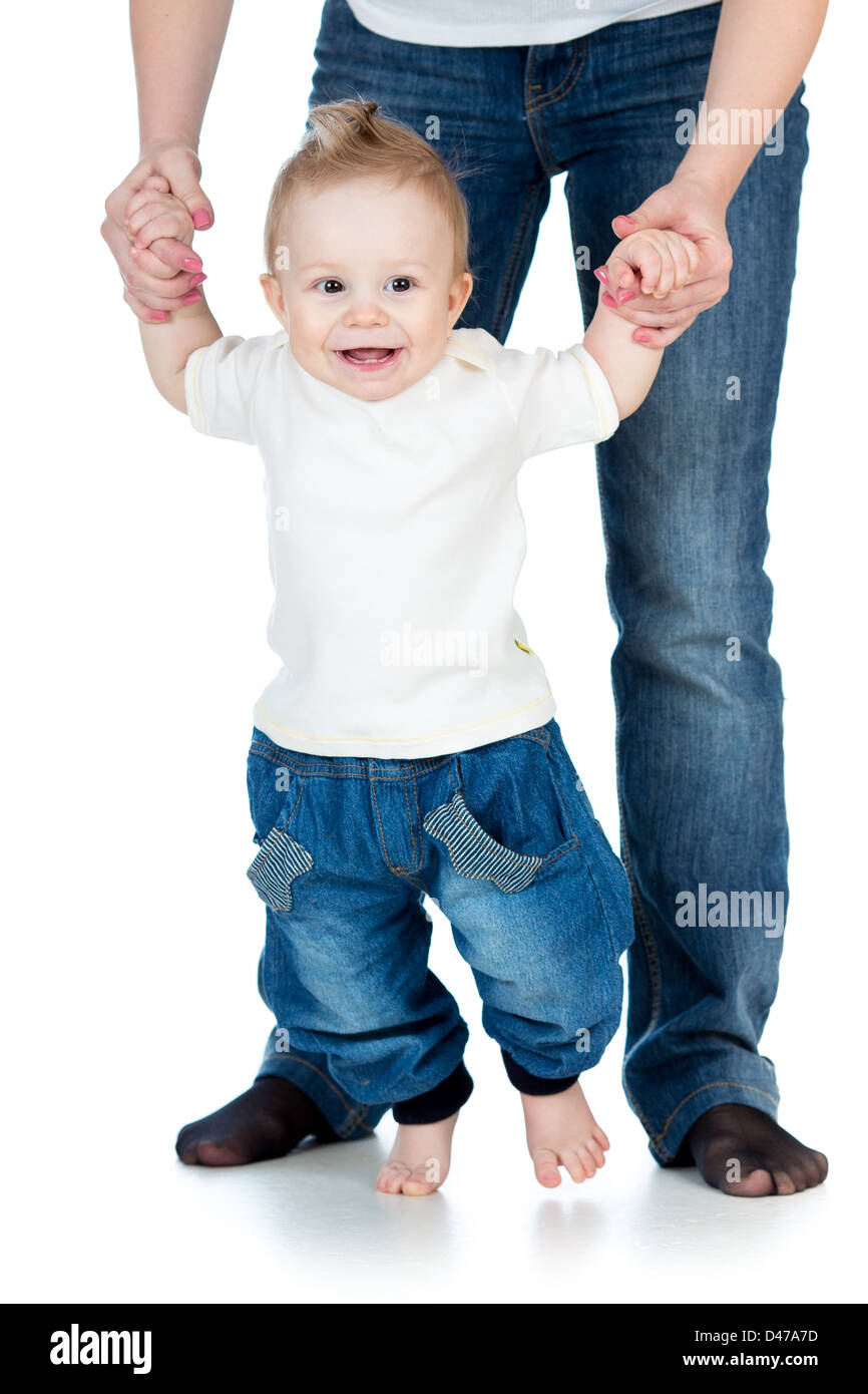 Steps First Time happy baby boy steps first time isolated Stock Photo - Alamy