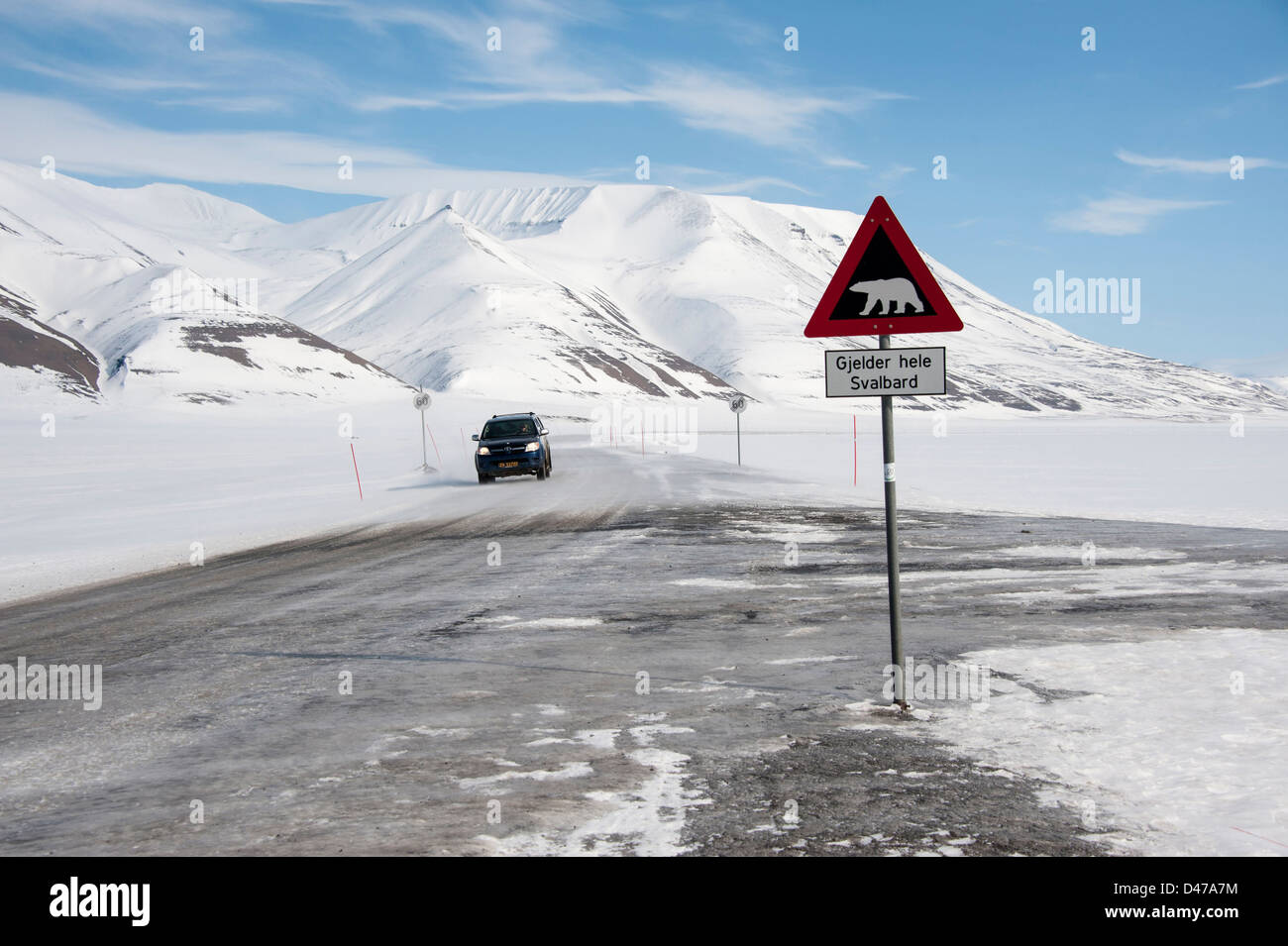 Road sign warning for ice-bears outside the village of Longyearbyen on Svalbard in the Arctic Stock Photo