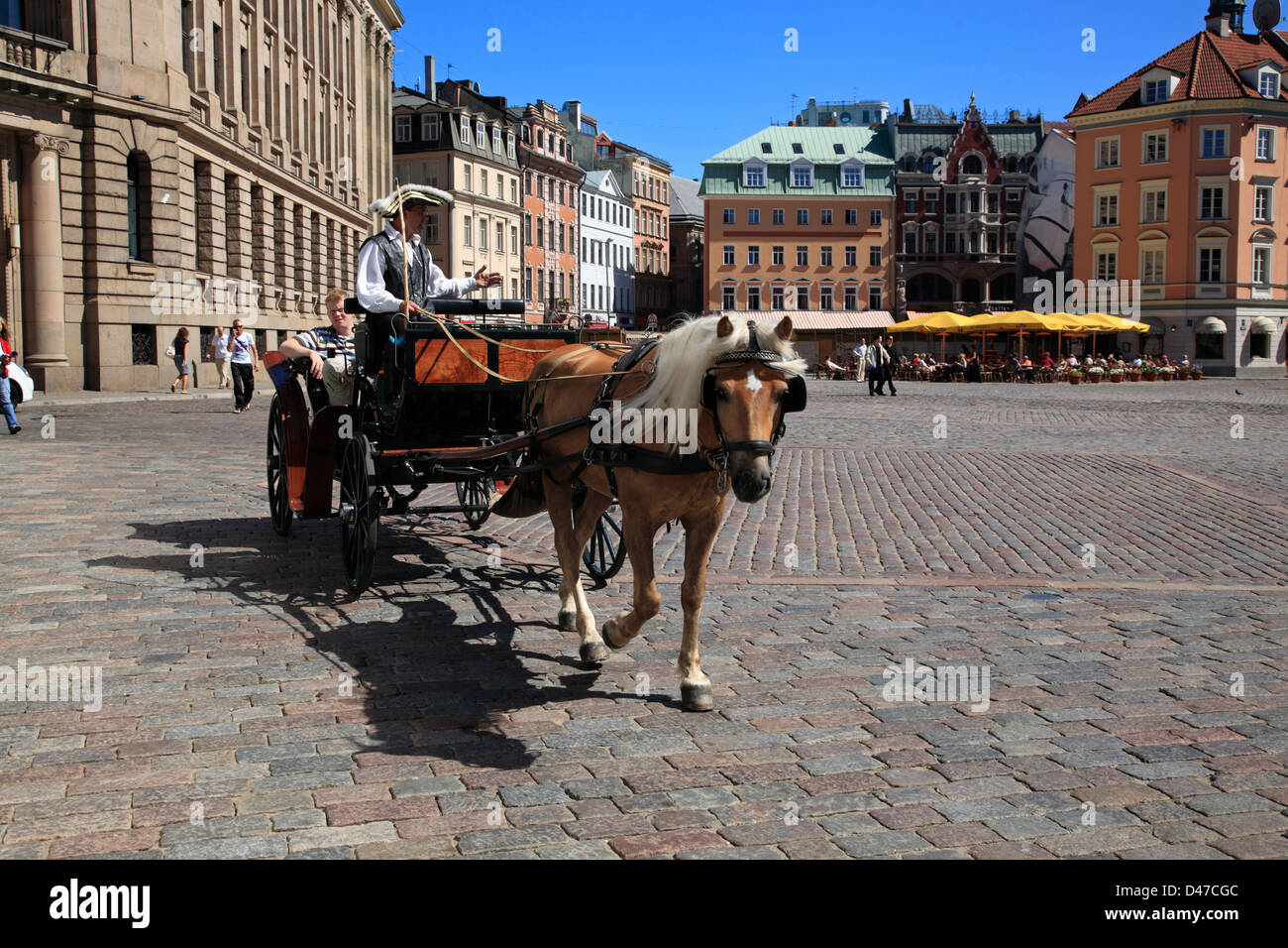 Horse-drawn carriage at Doma Laukums, Dome square, Riga, Latvia Stock Photo