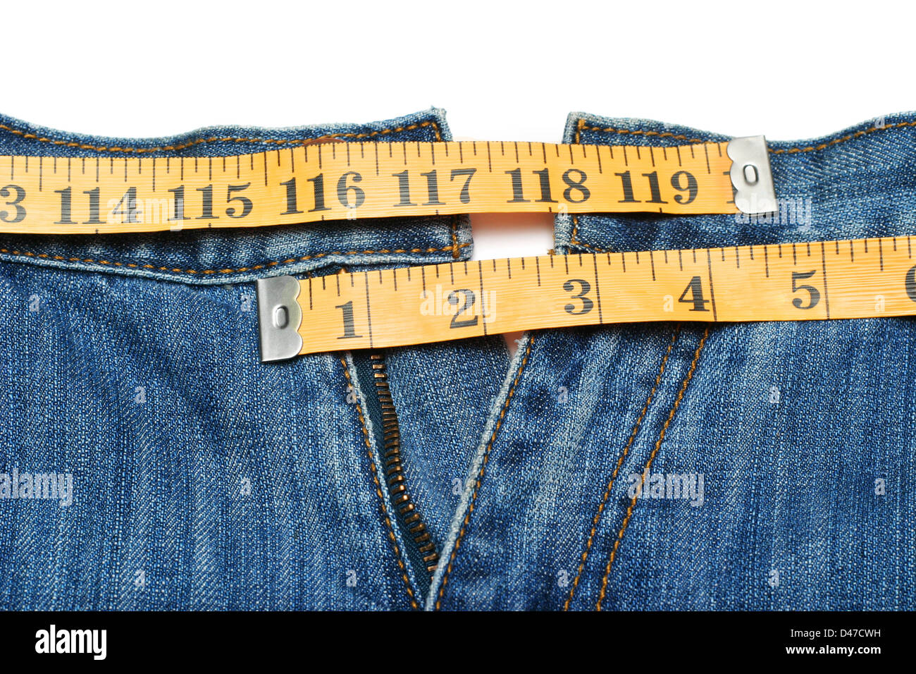 Jeans and tape measure Stock Photo