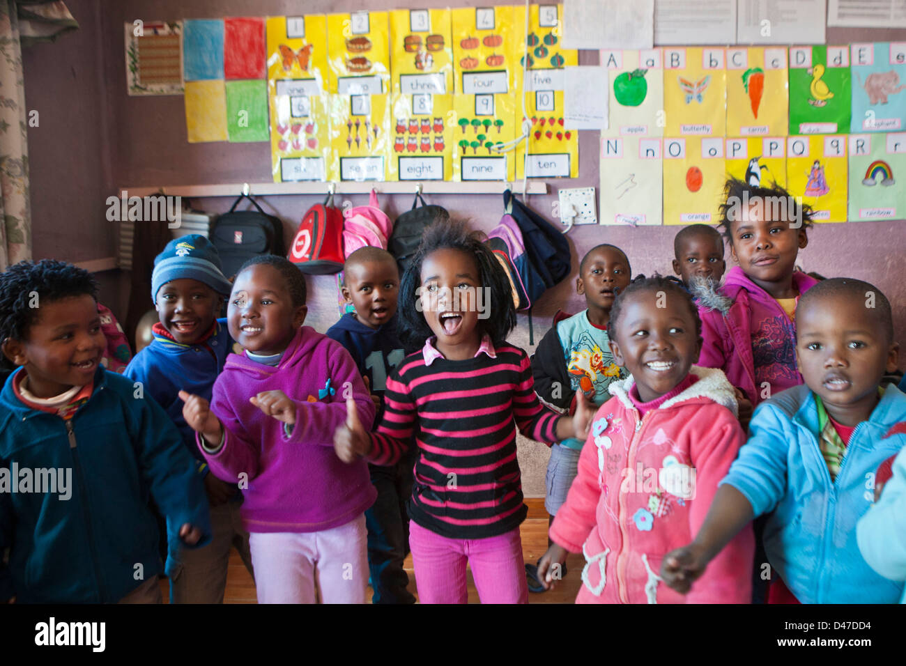 Young South African children dance and sing in an Early Childhood ...