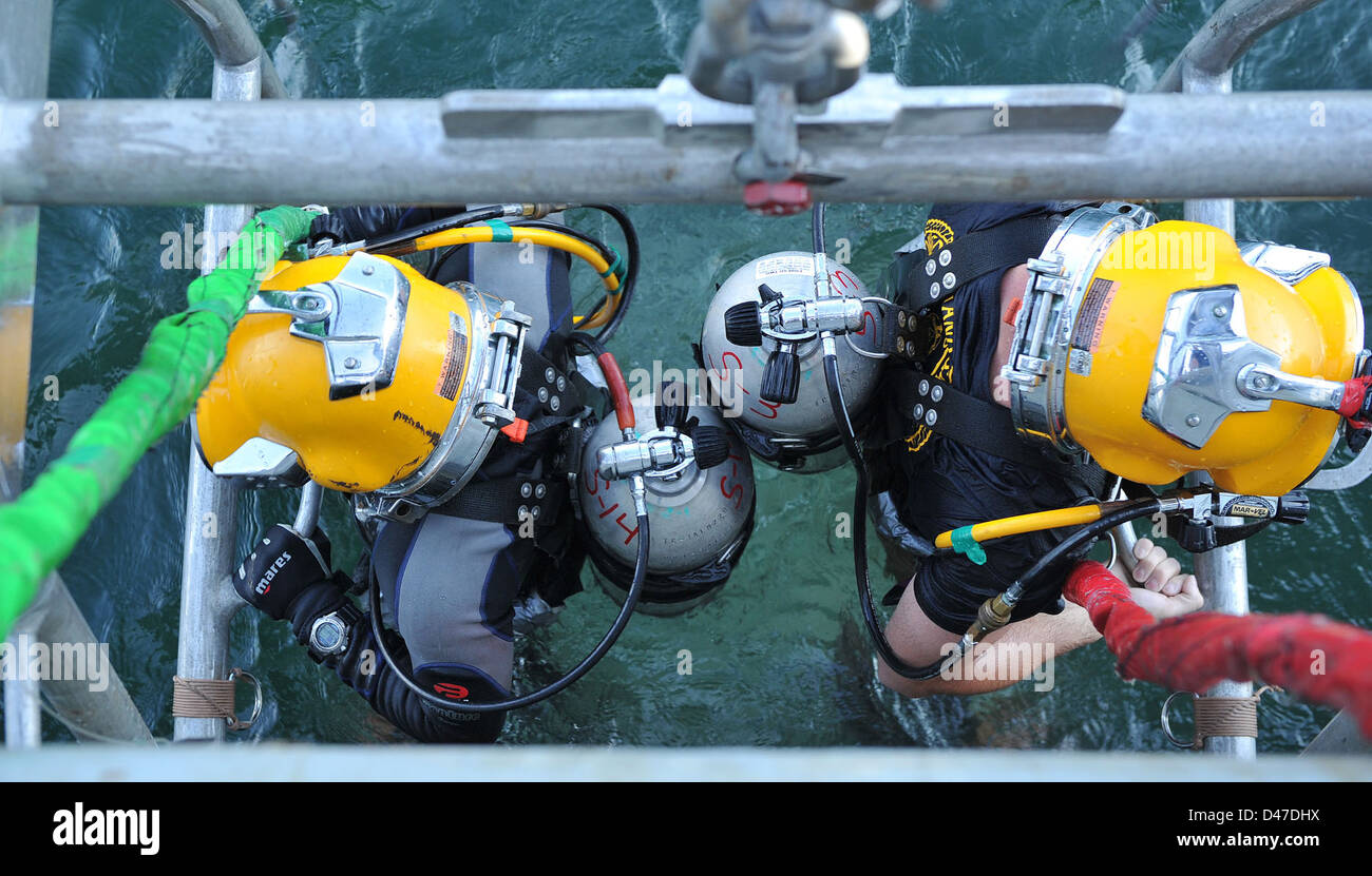 U.S. and Colombian navy divers conduct training. Stock Photo