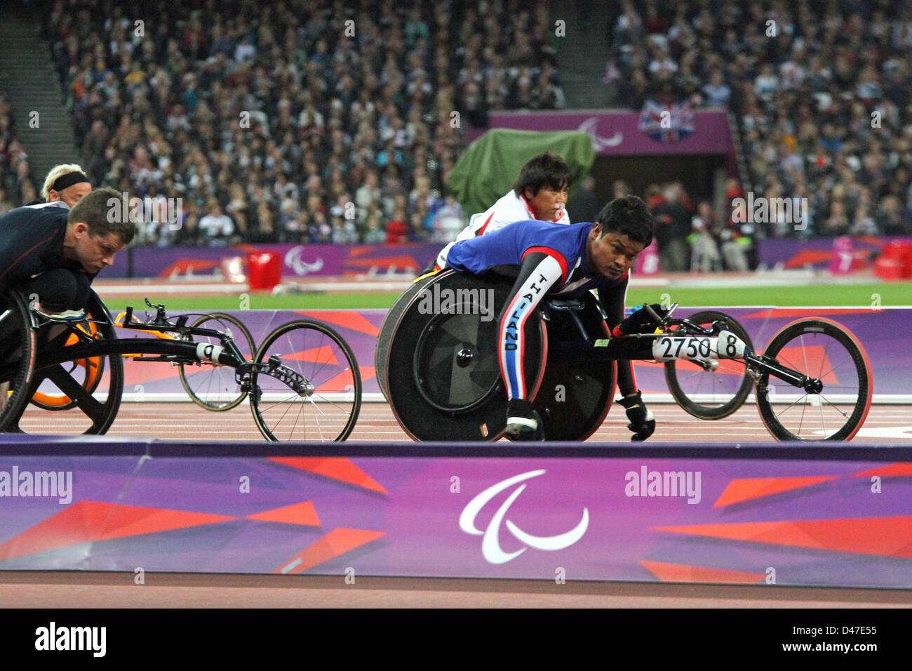 Peth Rungsri of Thailand in the Men's 100m - T52 in the Olympic stadium at the London 2012 Paralympic games. Stock Photo