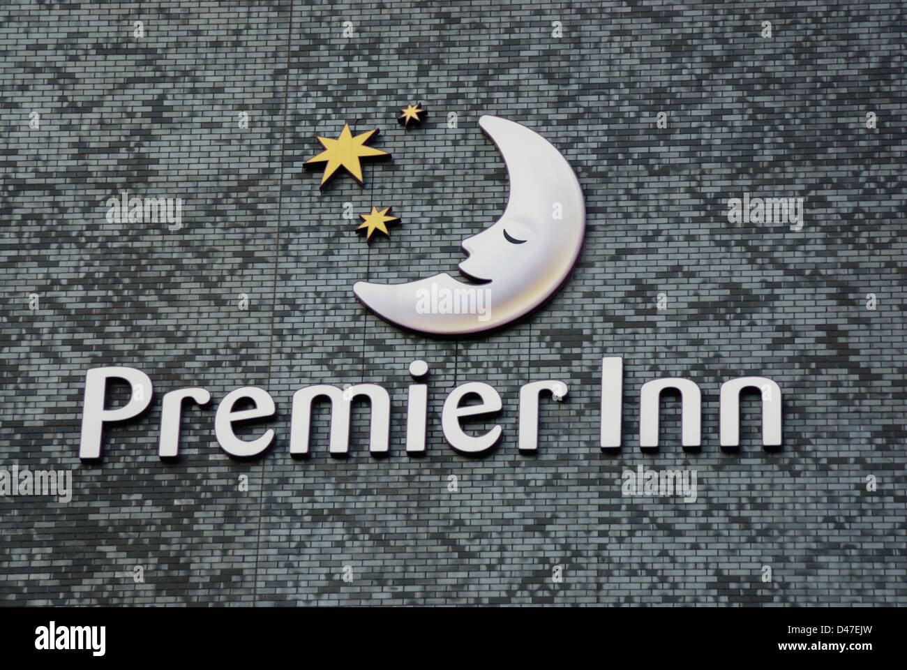 Premier Inn sign and logo on the side of their hotel in Manchester. Stock Photo