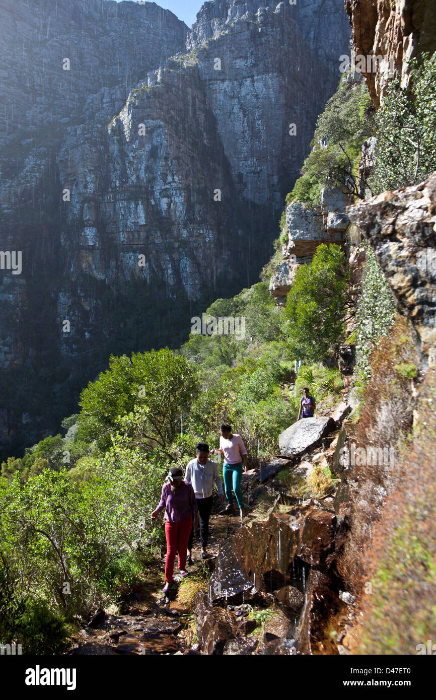 South African high school children hike up Table Mountain, Cape Town, South Africa. Part of environmental education program. Stock Photo
