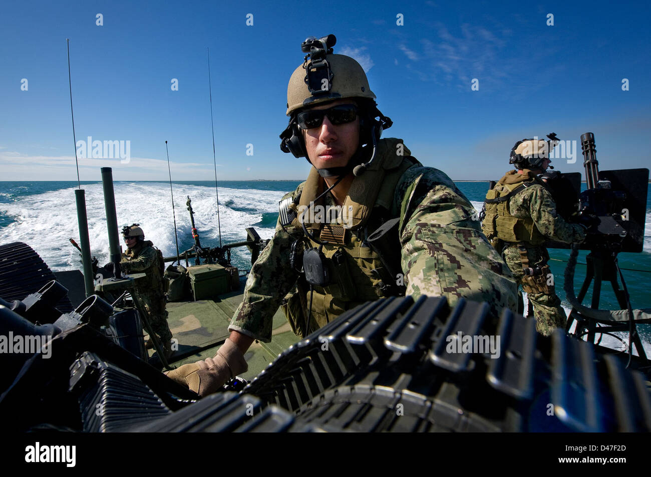 MasteratArms 3rd Class Steven Cabrera mans a twin .50caliber machine gun Stock Photo Alamy