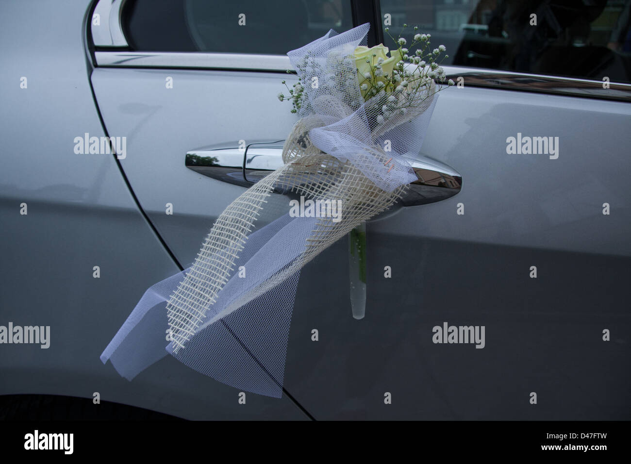 wedding flowers in a car Stock Photo Alamy