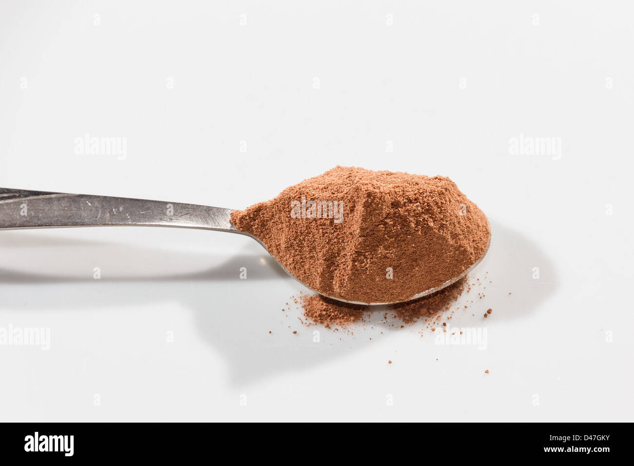 Spoonful of fresh ground coffee or cocoa Stock Photo