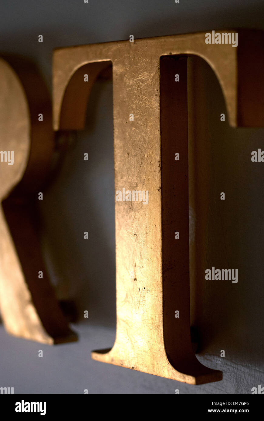 Gold painted wooden letter Stock Photo Alamy