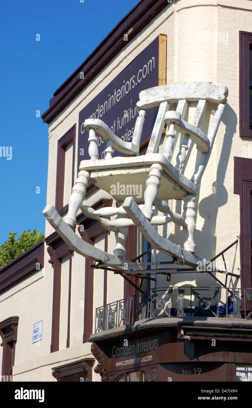 Large rocking chair on a shop front in Camden, London, England Stock ...