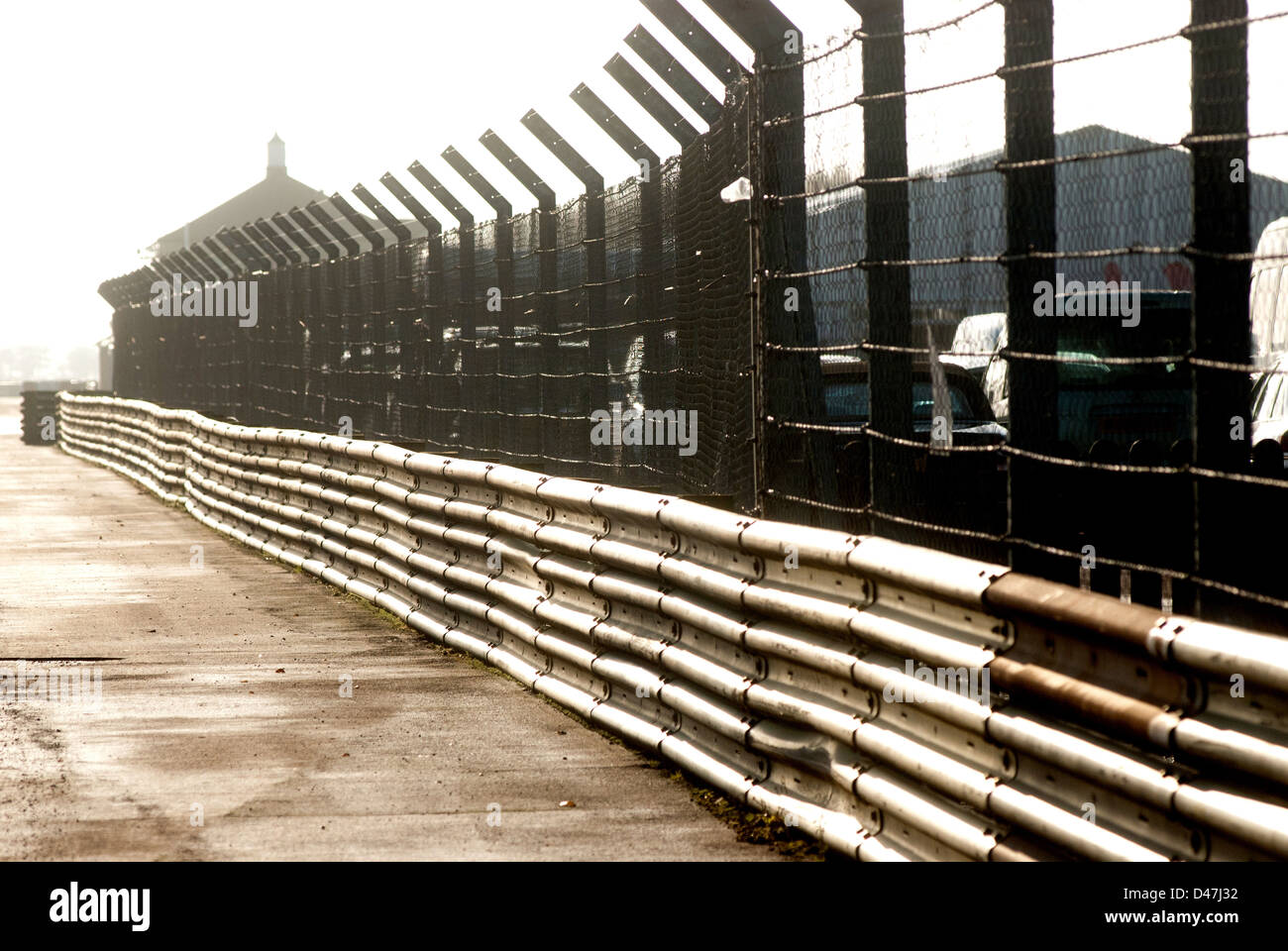 Crash barrier at Racing circuit Stock Photo Alamy