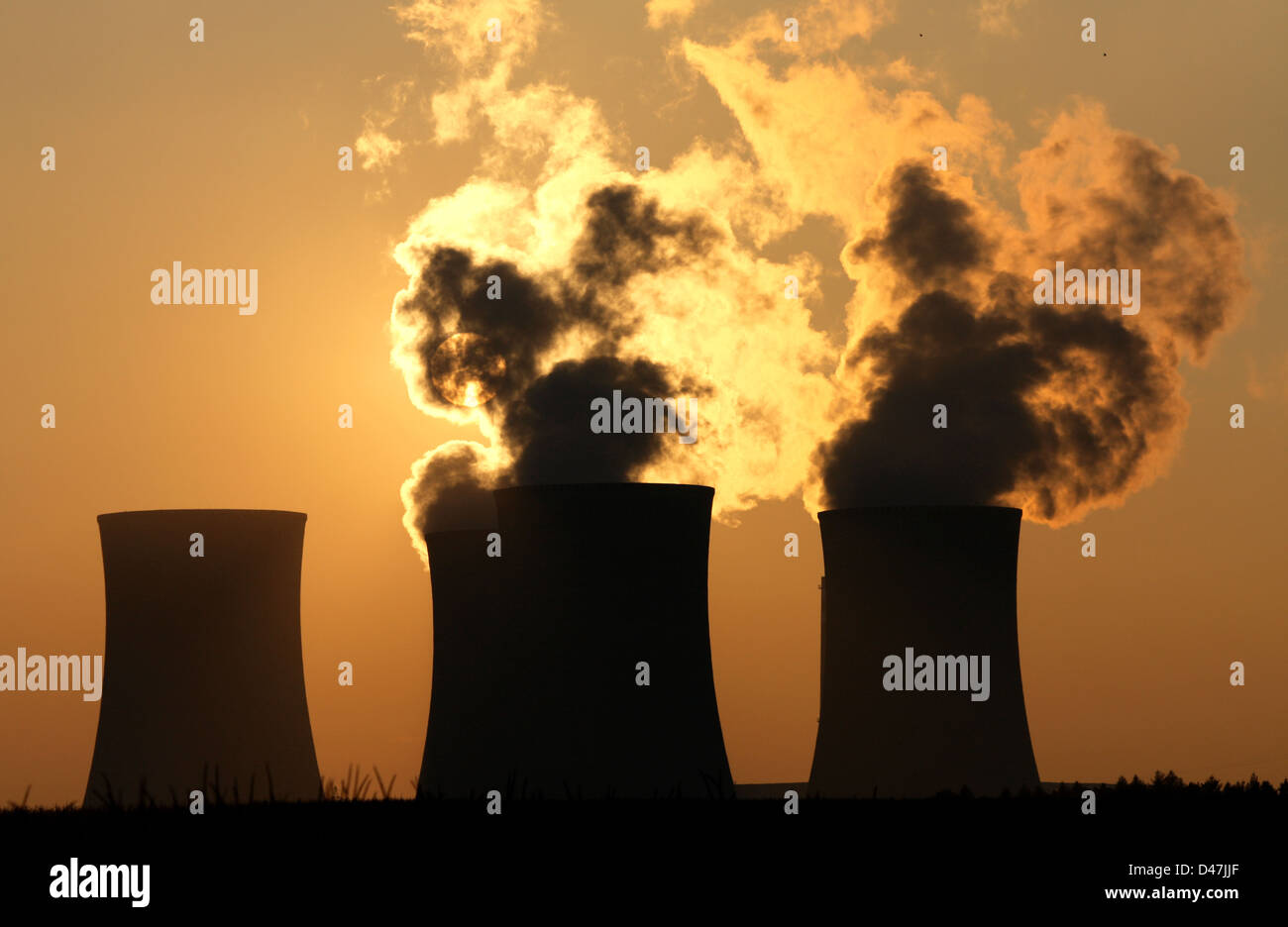 cooling towers of nuclear power plant during sunset Stock Photo - Alamy