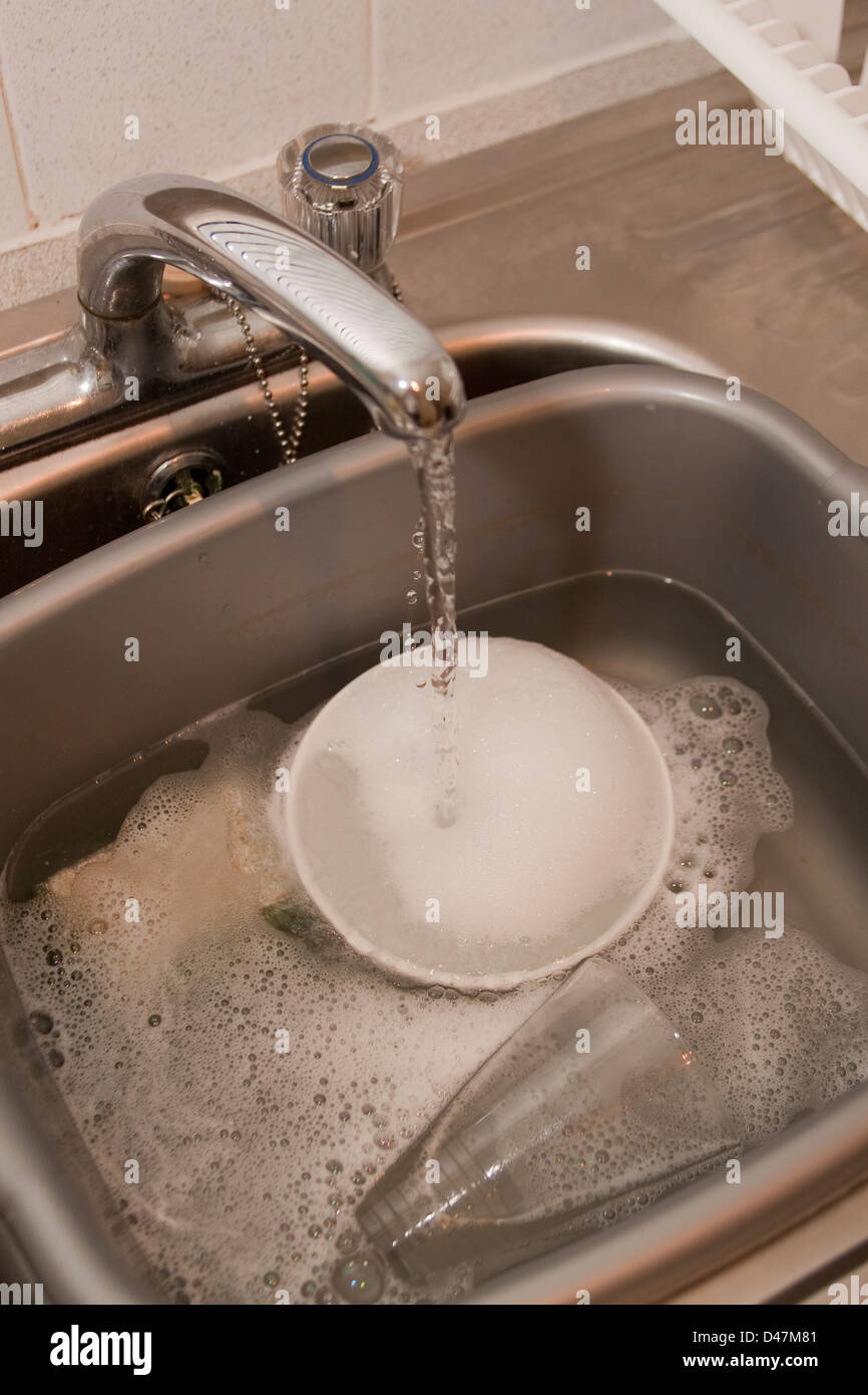 Dish washing basin filling with water Stock Photo Alamy