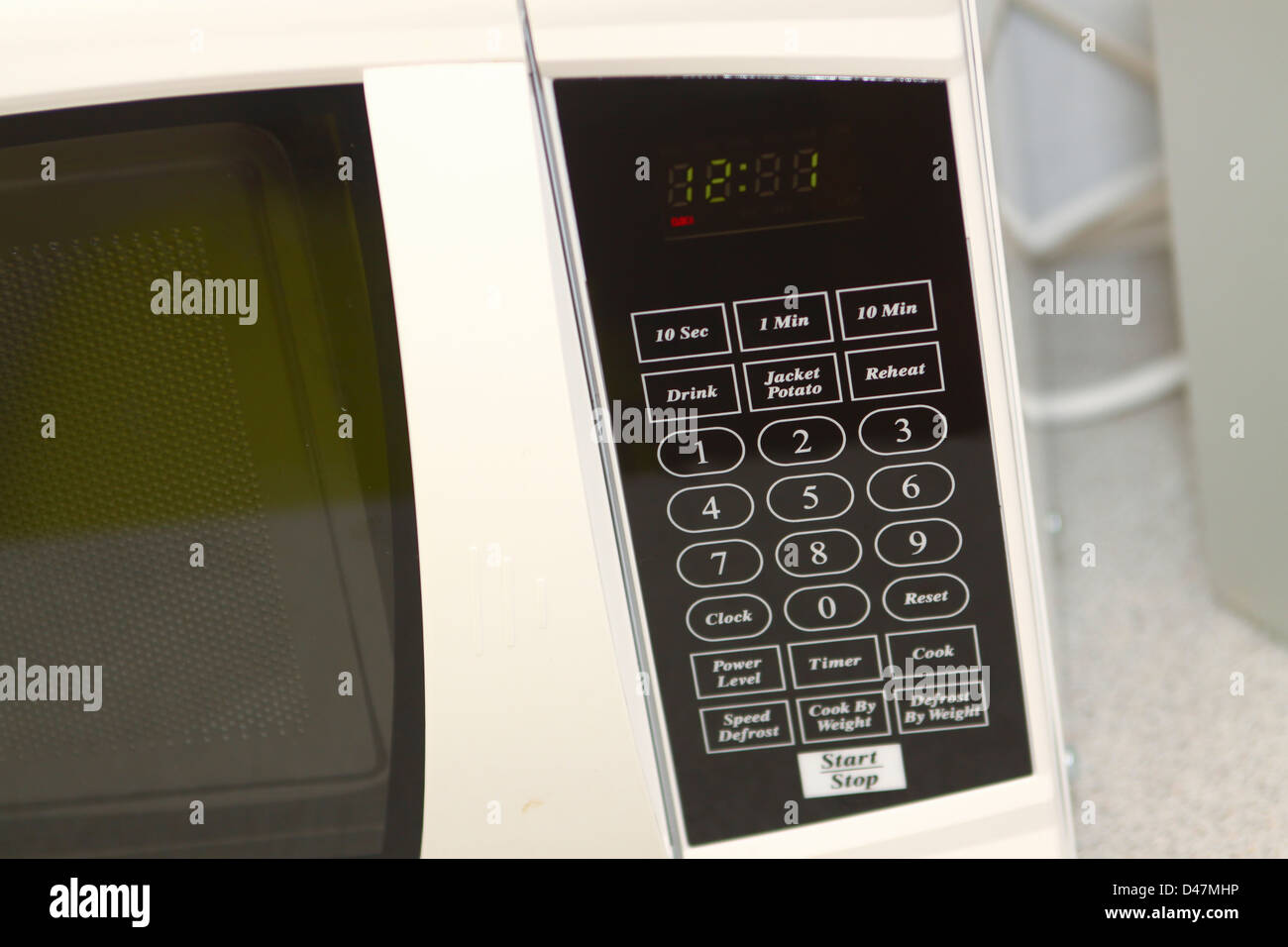 Digital control panel on microwave oven Stock Photo