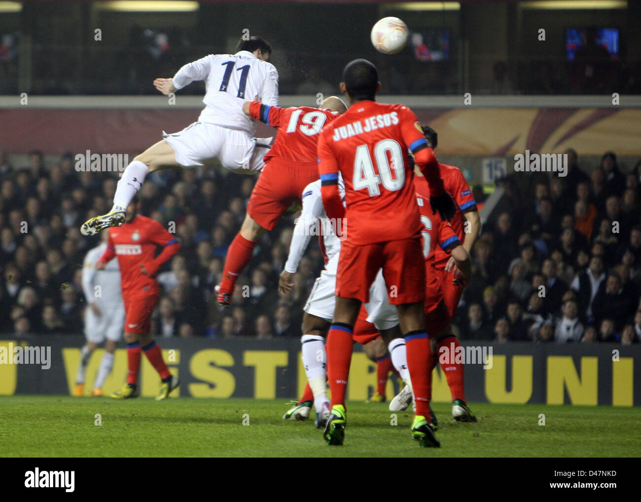 07.03.2013 London, England. Gareth Bale of Tottenham Hotspur scores the first goal with this headerin the 6th minute during the Europa League game between Tottenham Hotspur and Inter Milan from White Hart Lane. Stock Photo