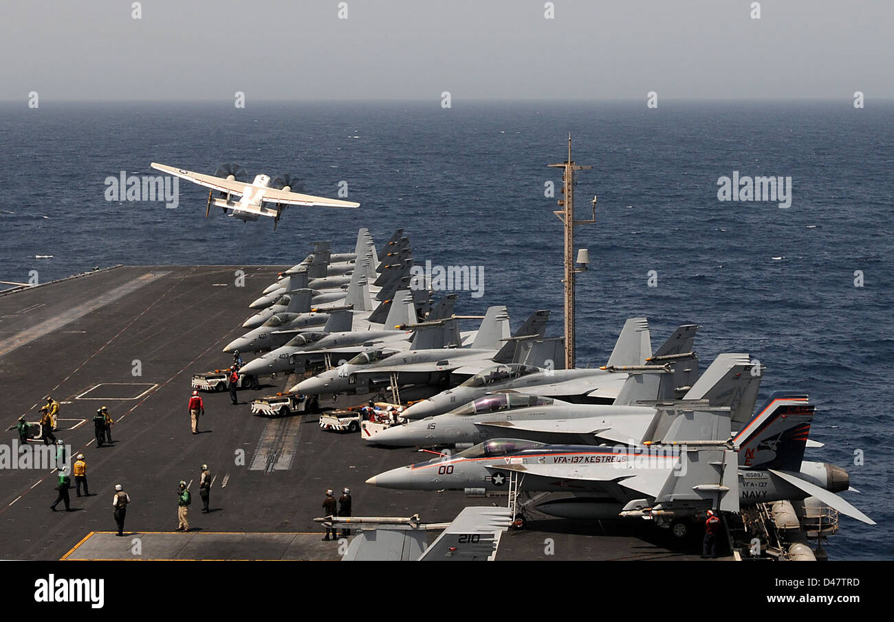 An airplane launches from the flight deck Stock Photo - Alamy