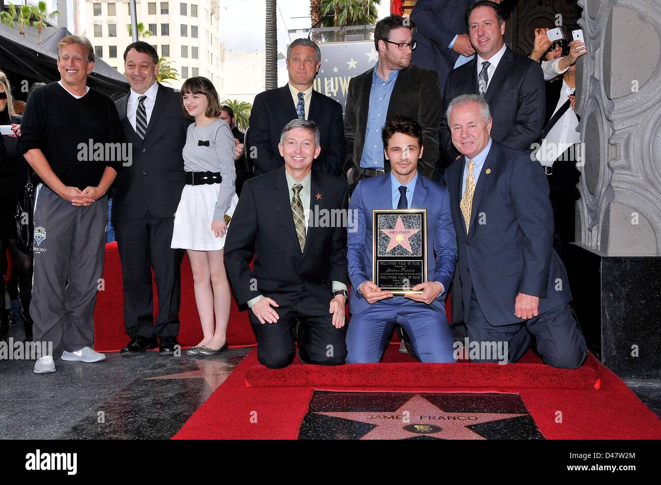 Joe Roth, Sam Raimi, Joey King, Leron Gubler, David Green, Seth Rogen, James Franco, Tom LaBonge, Christopher Barton at the induction ceremony for Star on the Hollywood Walk of Fame for James Franco, Hollywood Boulevard, Los Angeles, CA March 7, 2013. Photo By: Michael Germana/Everett Collection Stock Photo