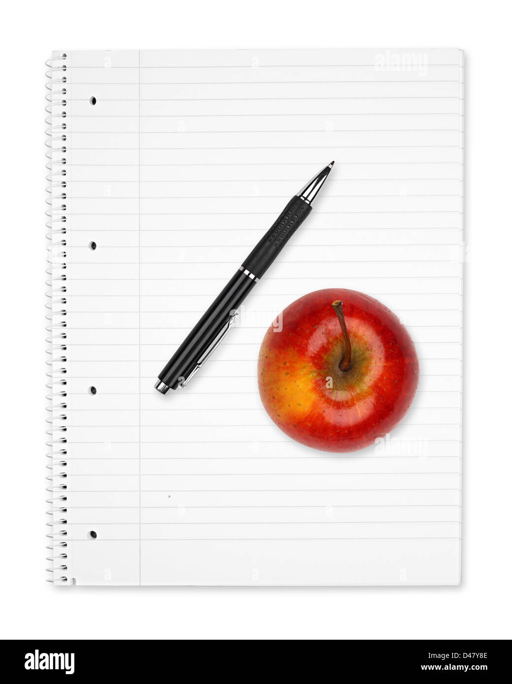 An apple on a notepad on white background. Stock Photo