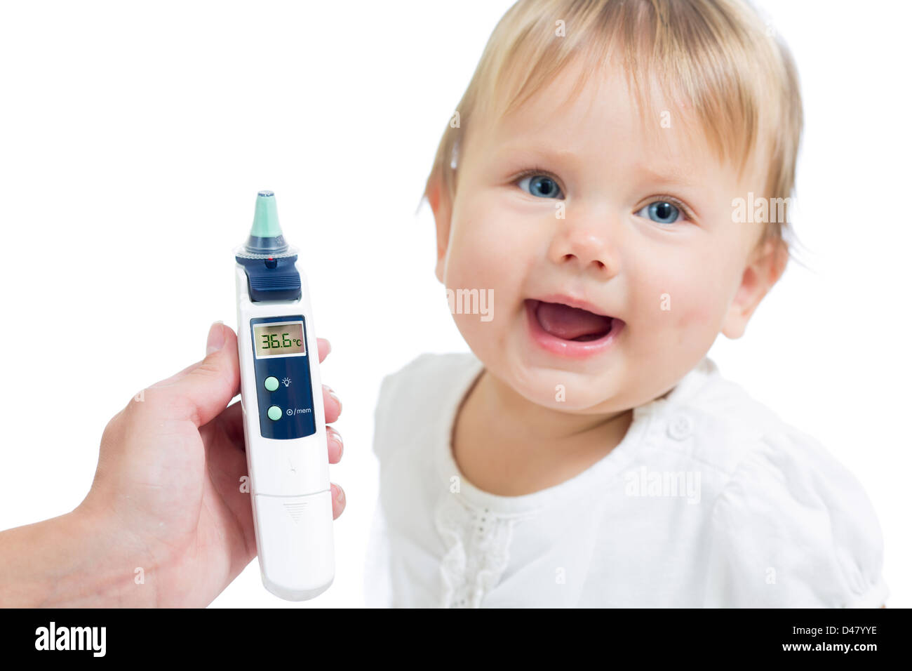 Thermometer displaying 36,6 Celsius degrees on defocused happy kid
