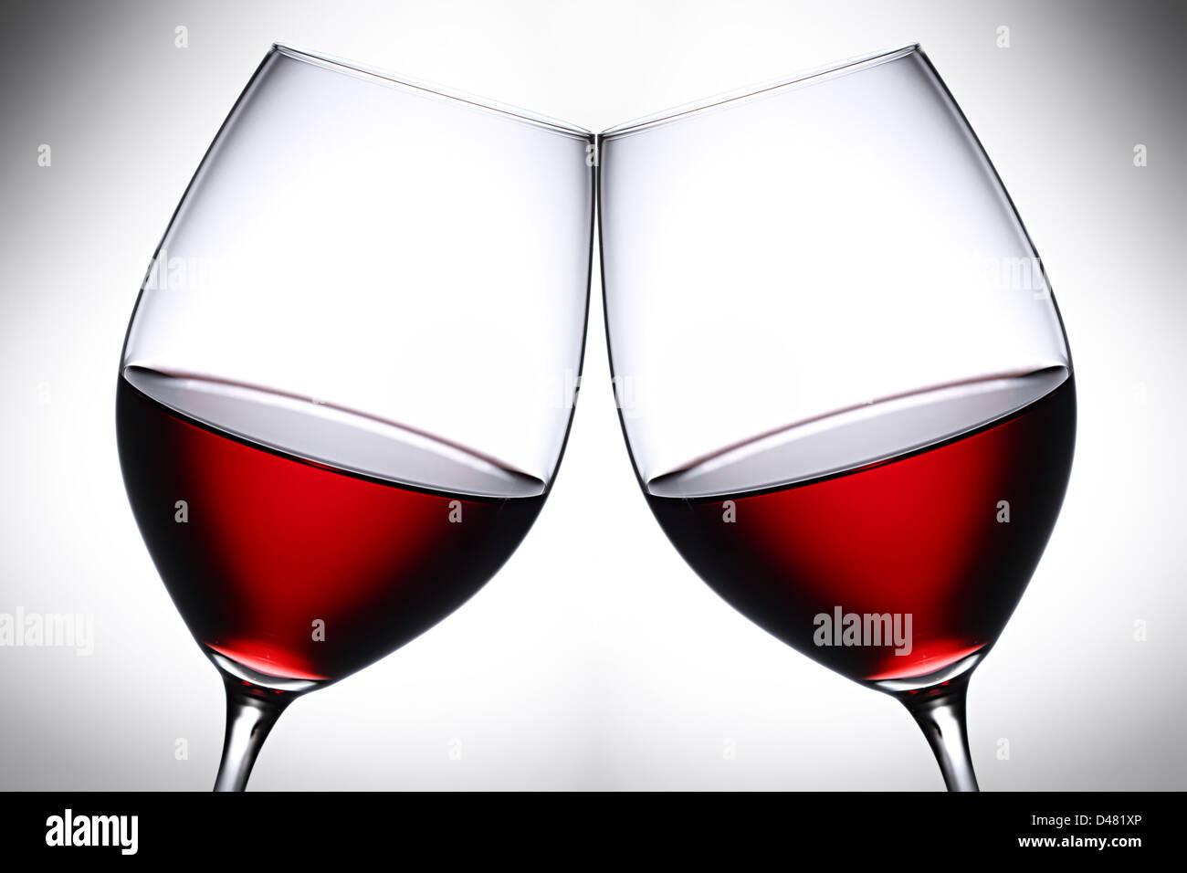 a pair of red wine glasses Stock Photo